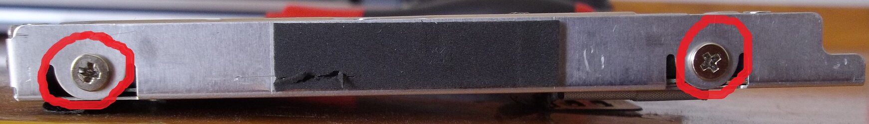 Screws on hard drive tray 1.JPG Screws on hard drive tray 1.JPG