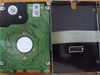 Hard drive out of tray.JPG